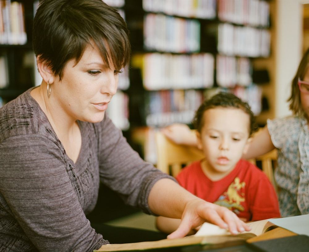 Early childhood educator reading with a child
