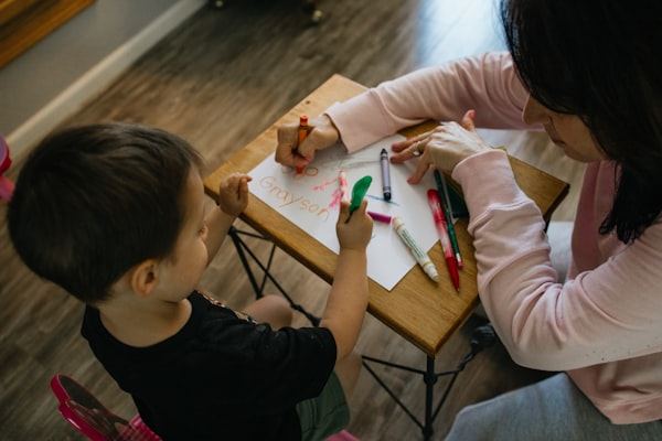 A child engaged in a hands-on learning activity at Mini Minds.